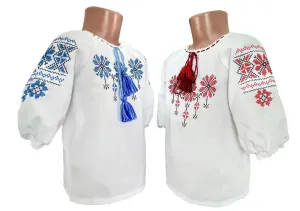 Embroidered blouse for a girl with a geometric ornament